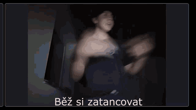 a blurry picture of a person with the words bez si zatancovat on the bottom right