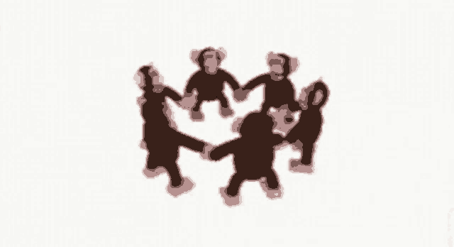 a group of stuffed monkeys are dancing in a circle .