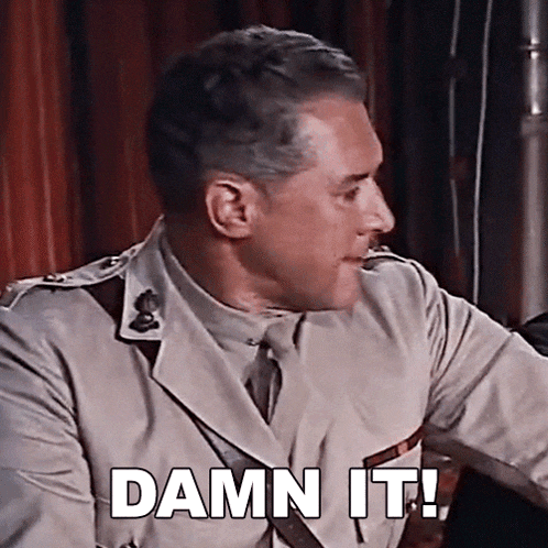 a man in a military uniform is saying " damn it "