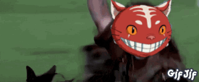 a gif of a person with a red mask on their face and the words gif jif on the bottom