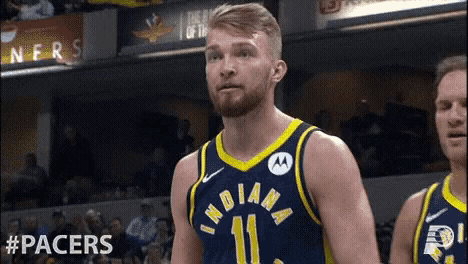 a basketball player wearing a jersey that says indiana 11