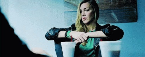 Katie Cassidy Chair GIF - Katie Cassidy Chair Look GIFs