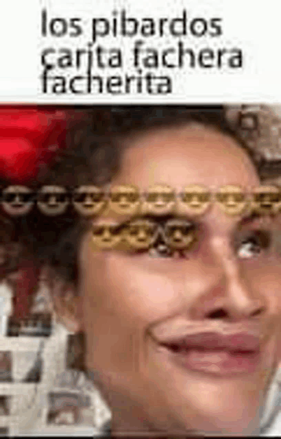 a woman with a red flower in her hair is making a funny face with cookies in her eyes .