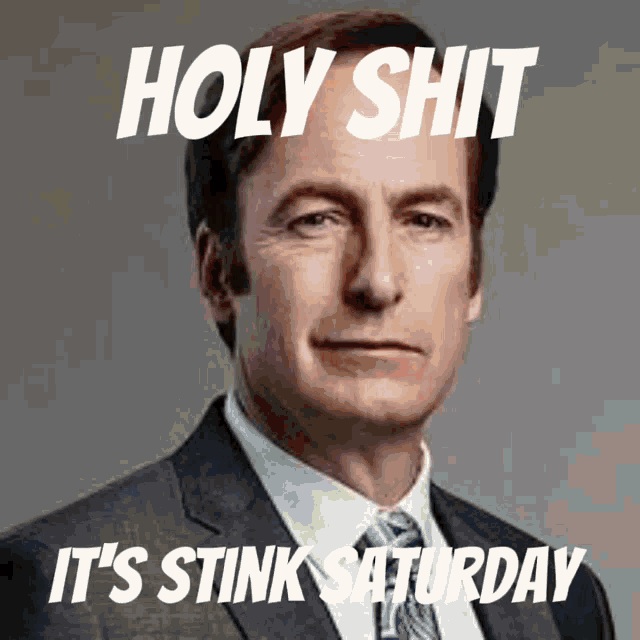 a picture of a man in a suit and tie with the words holy shit it 's stink saturday