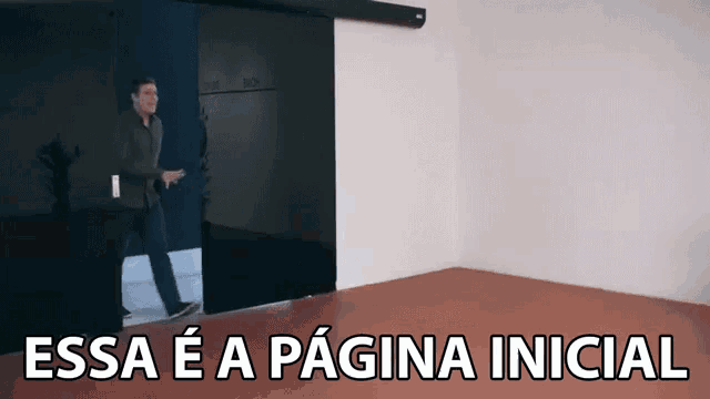 a man walking through a door with the words essa e a pagina inicial