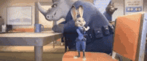 judy hopps is standing next to a rhinoceros in a diner .