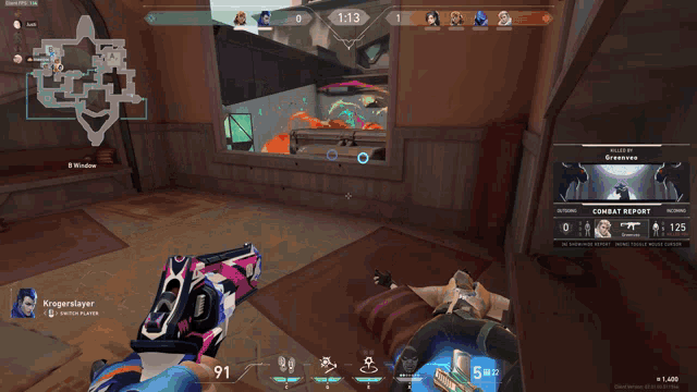 a person holding a gun in front of a screen that says kingdom