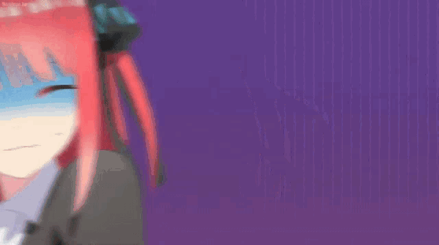 a girl with red hair is making a shocked face