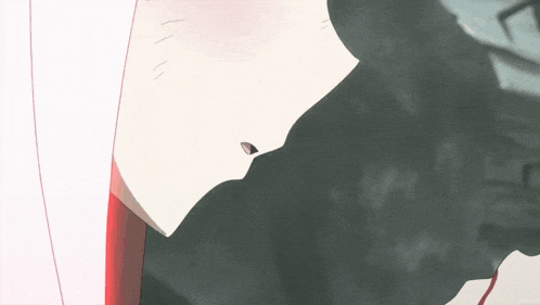 a close up of a person 's face with a shadow of a person behind them