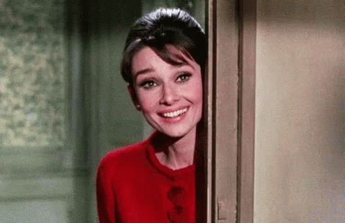 Audrey Hepburnm Smile GIF - Audrey Hepburnm Smile Chuckle GIFs