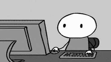 a stick figure is sitting at a desk in front of a computer .