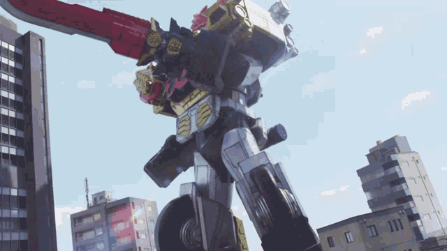 a robot with a sword is standing in front of a city skyline