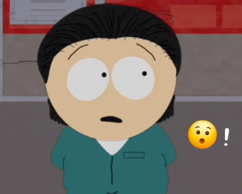 a cartoon character with a surprised look on his face next to an exclamation mark