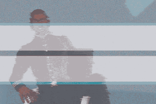 a blurred image of a person with a blue and white striped background