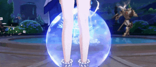 a woman 's legs are standing in front of a large blue ball .