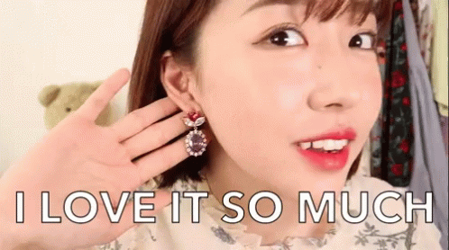 I Love It So Much Earing GIF - I Love It So Much Earing Jewelry GIFs