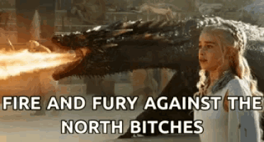 a woman is standing next to a dragon that is smoking fire .