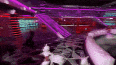 a blurred image of a staircase with purple lights on it