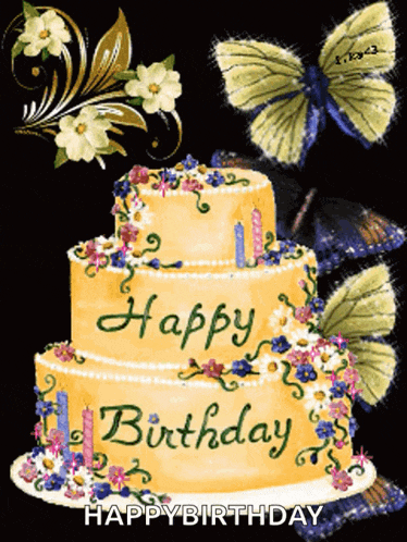 a birthday cake with butterflies and flowers on it