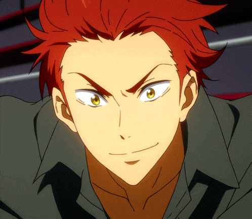 a close up of a man 's face with red hair