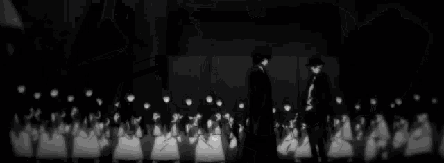a black and white photo of a person holding a gun with the word matsu written below it
