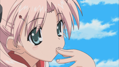 a girl with pink hair and a flower in her hair