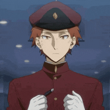 a man with red hair is wearing a red jacket and a black hat with a diamond on it