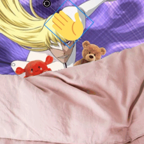 a teddy bear and a stuffed crab are laying on a bed with a cartoon character in the background