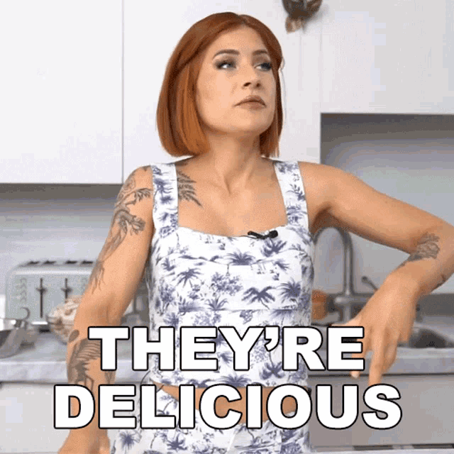 a woman says they 're delicious while standing in a kitchen