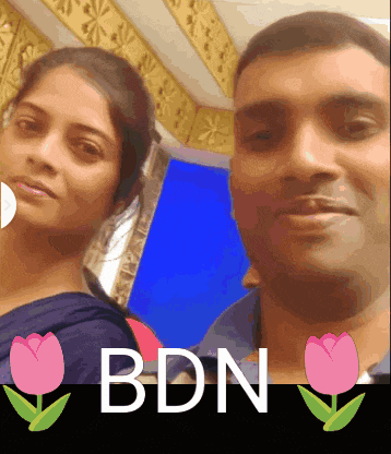 a man and a woman are posing for a picture with the letters bdn in the corner