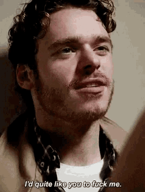 a man with a beard is saying `` i 'd quite like you to fuck me . ''