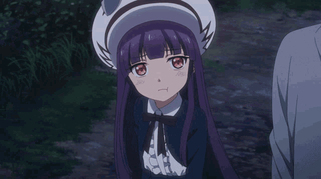 a girl with purple hair wearing a white hat with a pumpkin on it