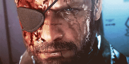 a close up of a man 's face with blood on it