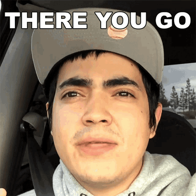 a man wearing a hat that says " there you go "
