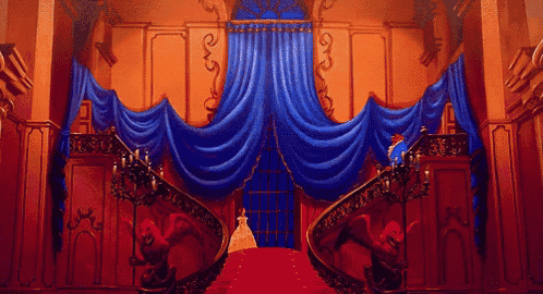 a woman in a white dress is walking down stairs in a castle