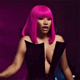 a woman with a pink wig and red nails is wearing a black dress
