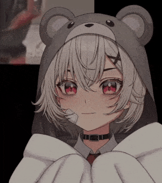 a girl with white hair and red eyes wearing a teddy bear hat