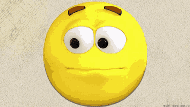 a yellow smiley face with a sad look on it