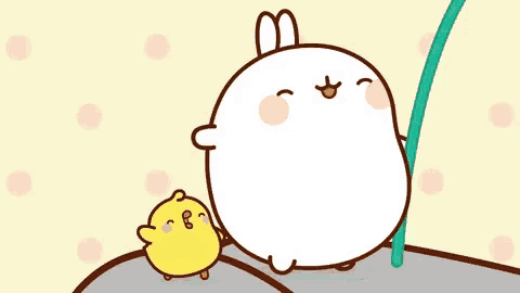a white rabbit and a yellow chicken are standing next to each other on a rock .