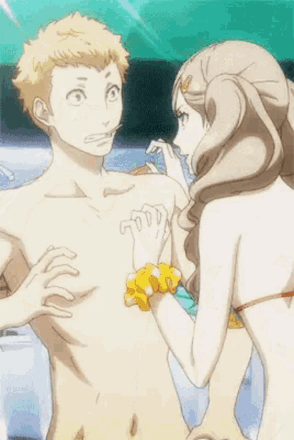 a man and a woman are standing next to each other in a bathtub and the woman is touching the man 's chest .