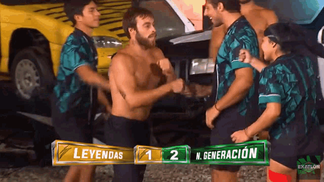 a group of men are standing in front of a sign that says leyendas and n. generacion