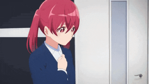 a girl with red hair is wearing a blue suit and white shirt .
