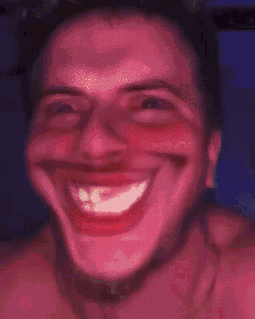 a close up of a person 's face with a funny face