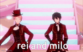 a couple of anime characters are standing next to each other on a stage and they are dancing .