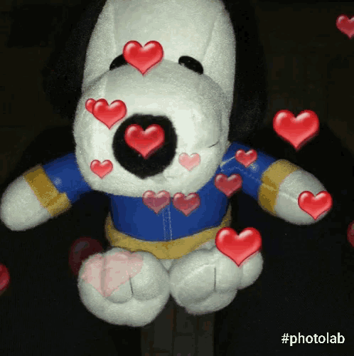 a stuffed animal with hearts coming out of its eyes and the hashtag photolab