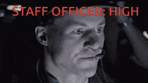 a man wearing a headset with the words staff officer high above his head