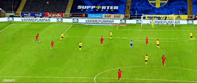 a soccer game is being played in a stadium with advertisements for scandic and bauhaus