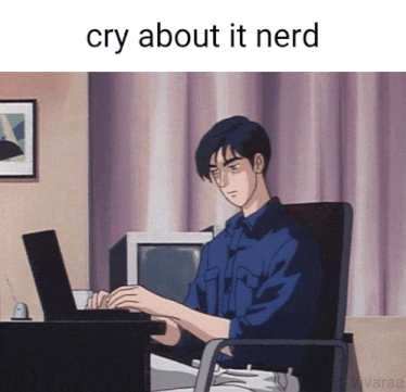 a man in a blue shirt is typing on a laptop with the words cry about it nerd above him