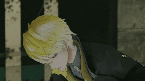 a man with yellow hair is laying down with his head on his hands