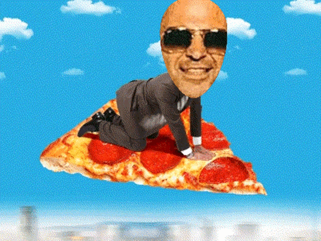 a man in a suit and sunglasses is crawling on a pepperoni pizza
